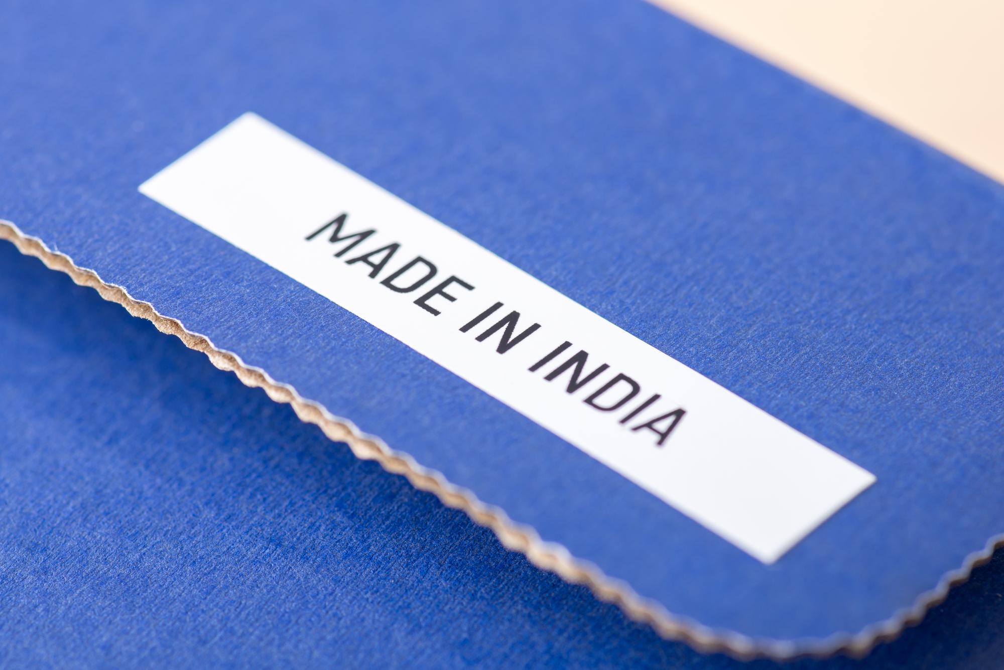 row of embroidered labels ready for shipment