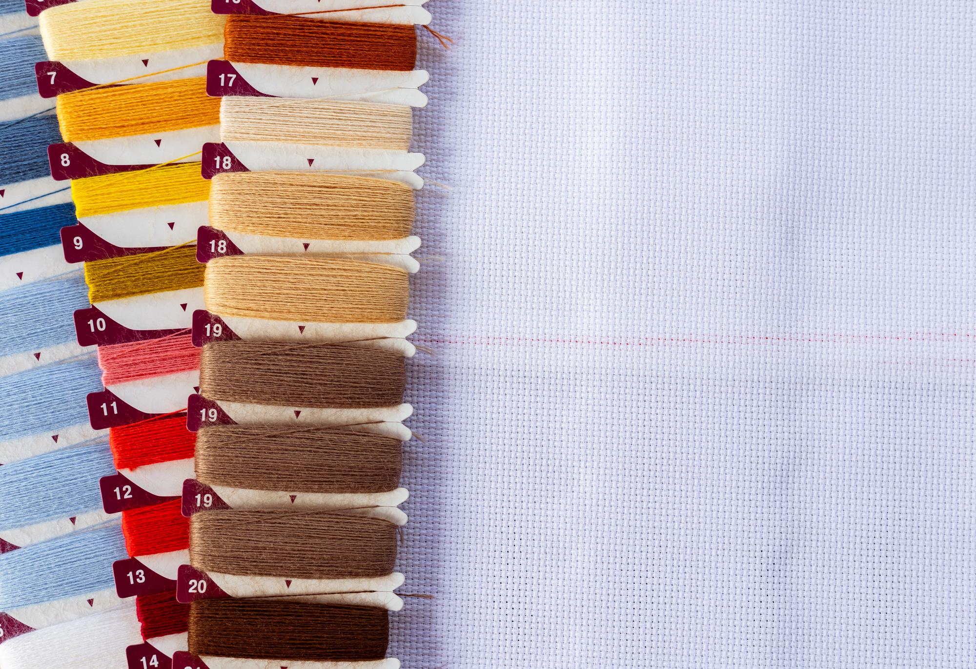 assortment of embroidered fabric swatches